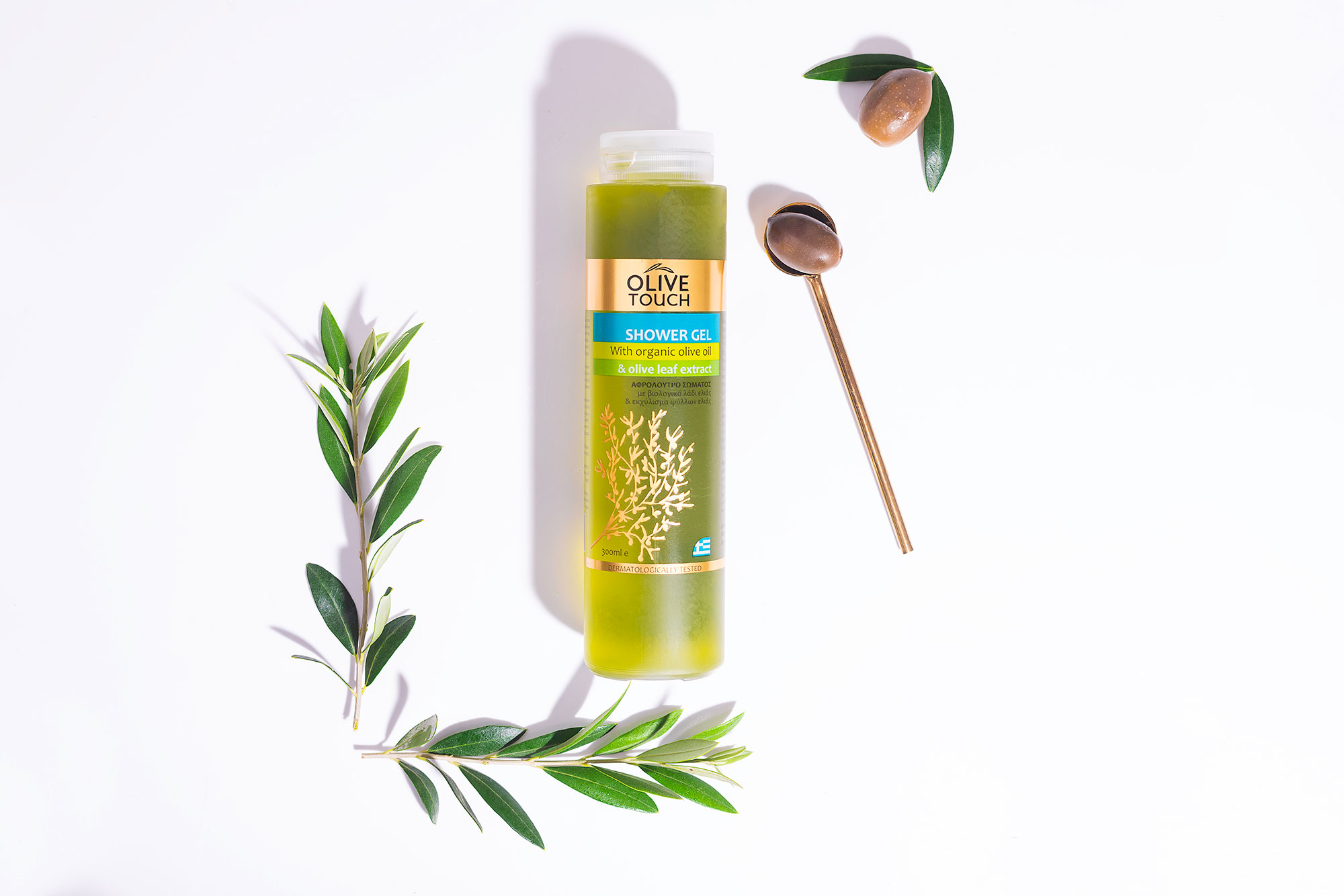 Olive-touch-shower-gel-olive-leaf-1.jpg Αφρόλουτρο με βιολογικό λάδι ελιάς και εκχύλισμα φύλλων ελιάς, SHOWER GEL WITH ORGANIC OIL 300ml - Image 1